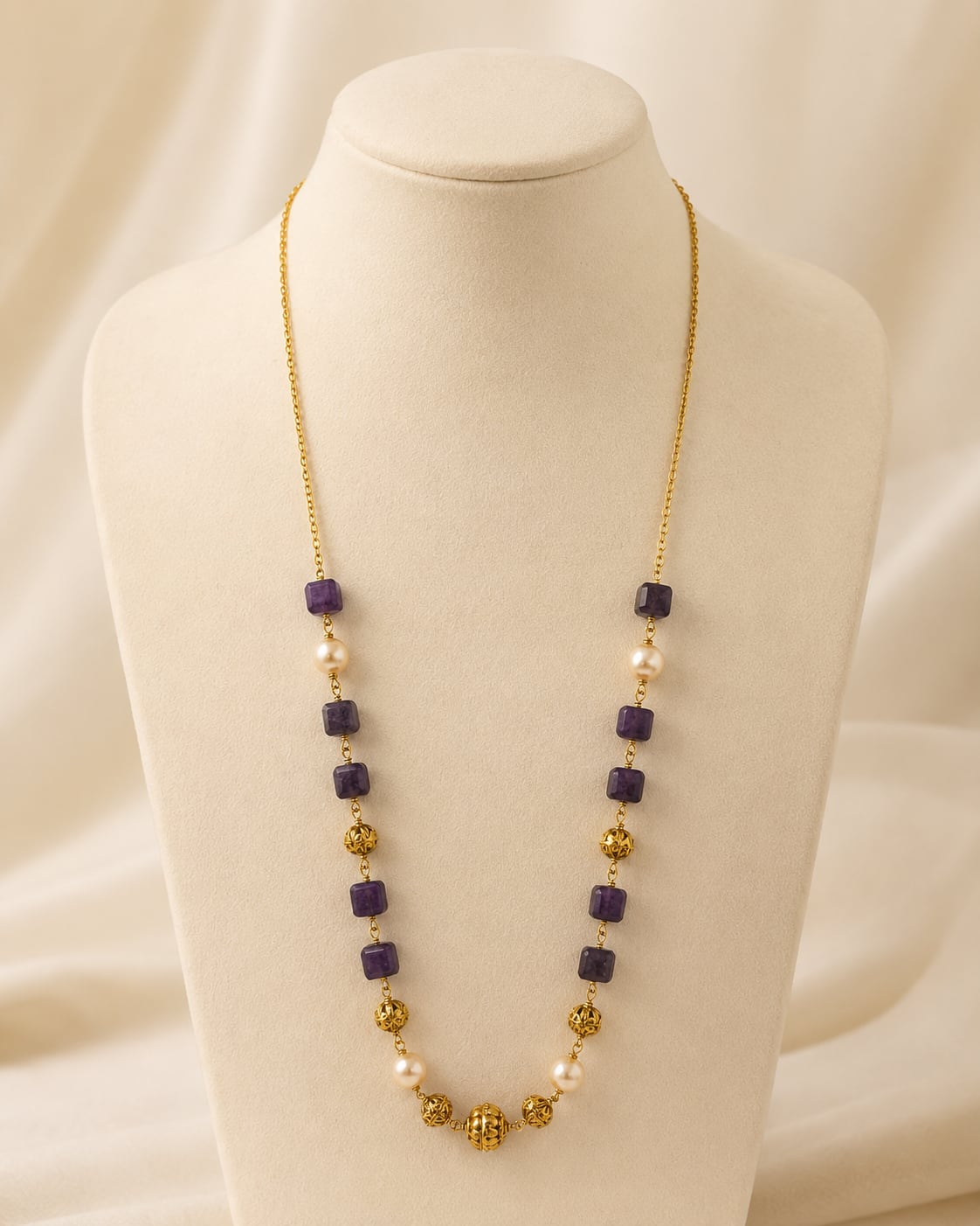 FeelOri Deep Plum Cube Bead and Pearl-Look Necklace on a necklace display