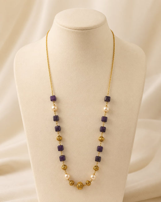 FeelOri Deep Plum Cube Bead and Pearl-Look Necklace on a necklace display