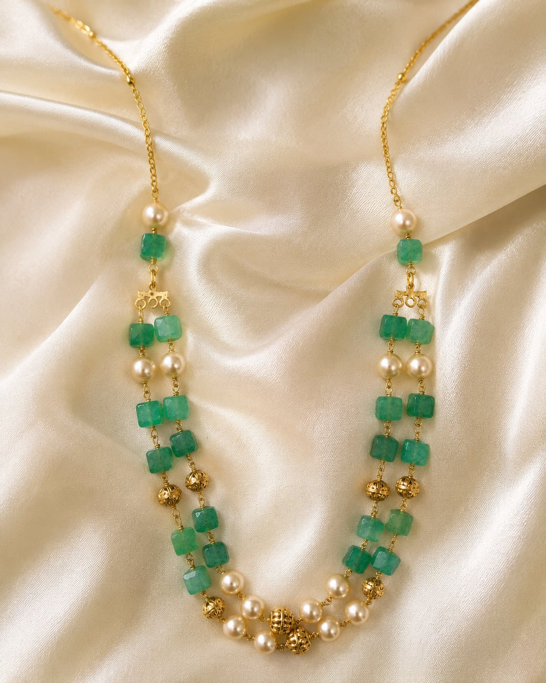 FeelOri gold-polished necklace styled with saree fabric for Indian occasion wear
