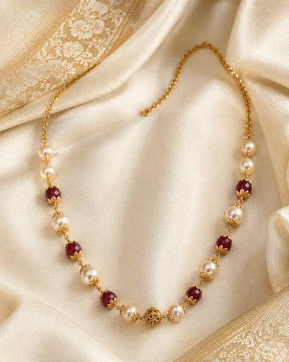 FeelOri gold-polished necklace styled with saree fabric for Indian occasion wear