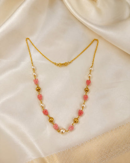 FeelOri gold-polished necklace styled with saree fabric for Indian occasion wear