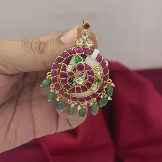 Video showing front, back, scale and green-bead fringe of the FeelOri Mayur Pathakam Peacock Pendant; pendant only, SKU FO-RKJ-0164.