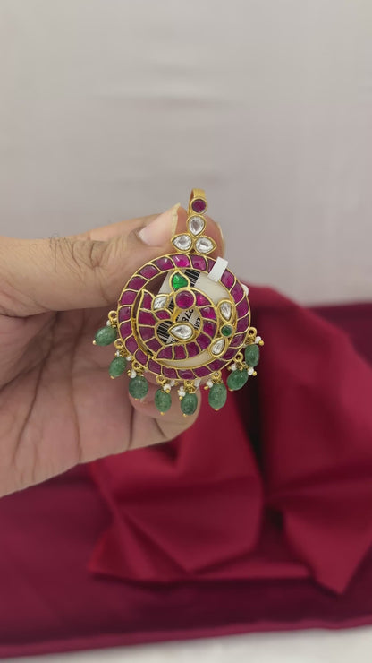 Video showing front, back, scale and green-bead fringe of the FeelOri Mayur Pathakam Peacock Pendant; pendant only, SKU FO-RKJ-0164.