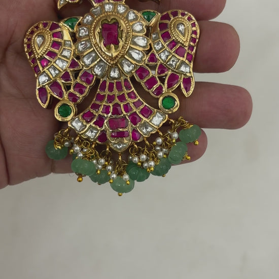 FeelOri FO-RKJ-0048 reversible Gandaberunda pendant showing its ruby-tone and white kundan sides.