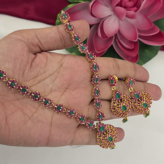Video of FeelOri Tamil Heritage Necklace Set with ruby- and emerald-tone stones and matching earrings, SKU FN68.