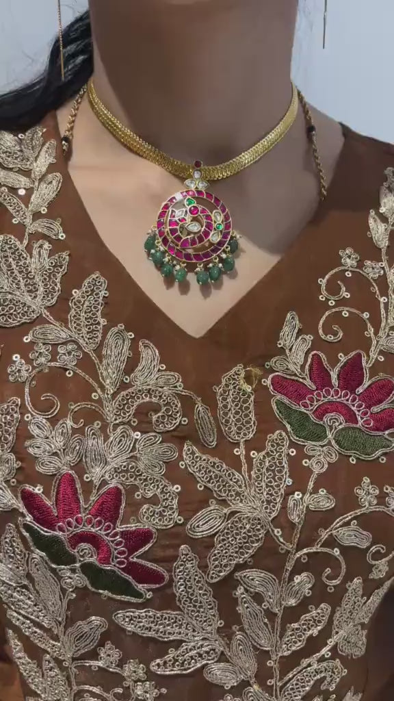Video of FeelOri Mayur Pathakam Peacock Pendant styled on a chain for scale; pendant only, SKU FO-RKJ-0164.