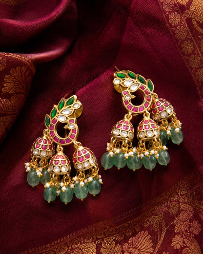 FeelOri jadau kundan jhumka earrings styled with saree fabric for Indian occasion wear