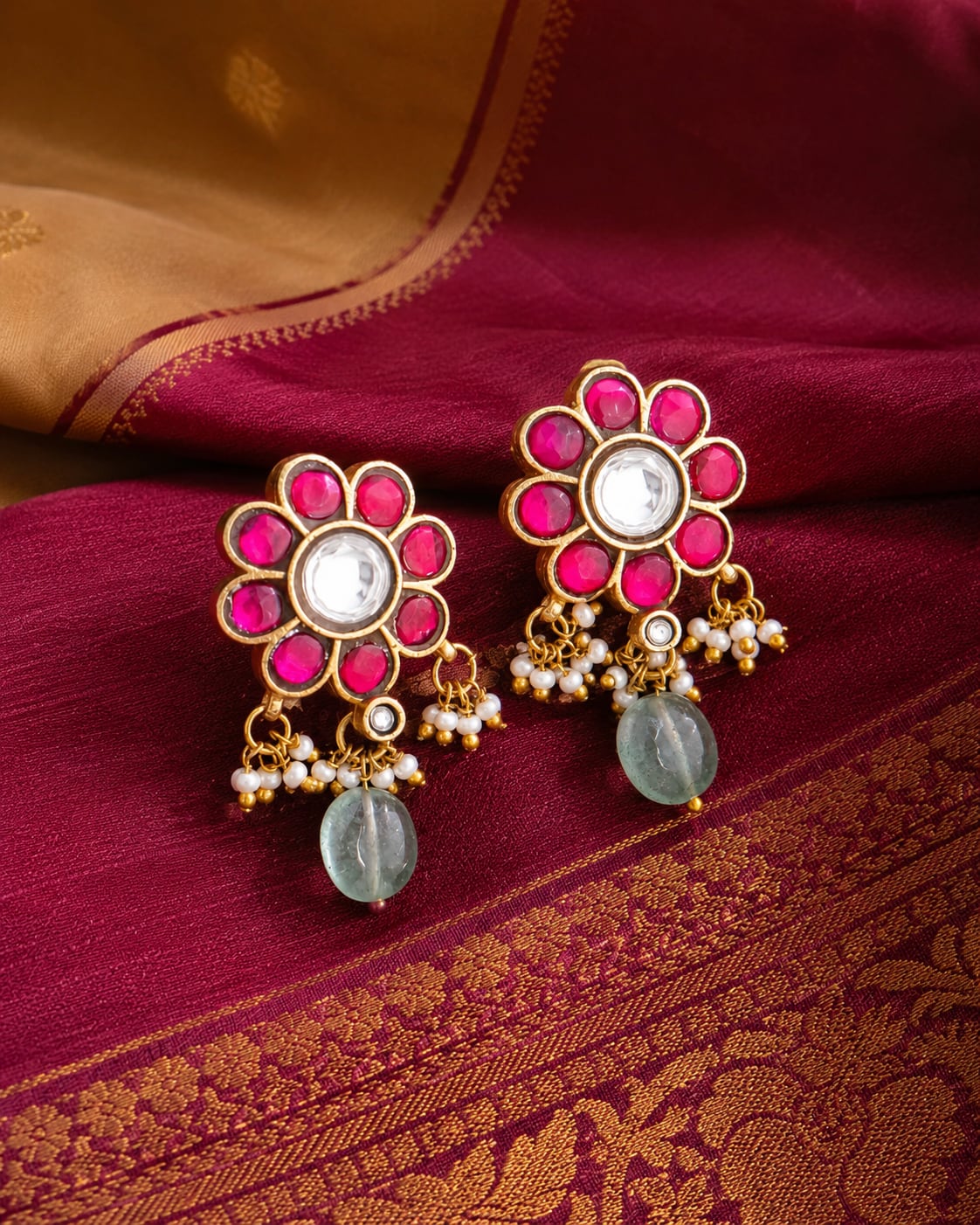FeelOri real kempu jadau stud earrings styled with saree fabric for Indian occasion wear
