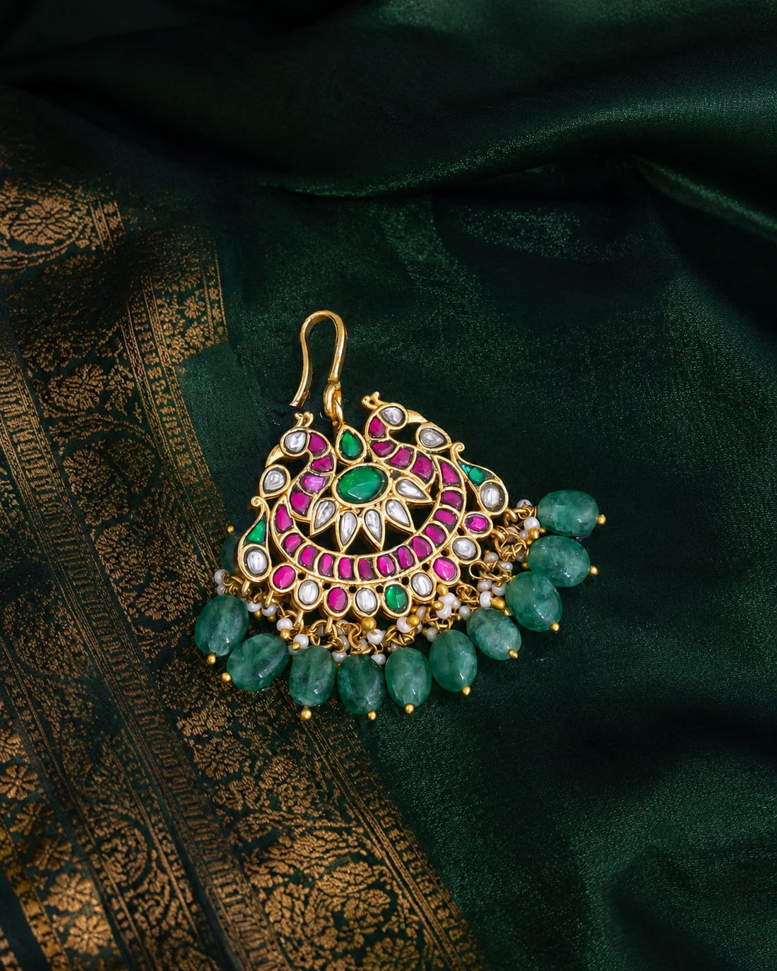FeelOri round fan green drop jadau kundan maang tikka listed as maang tikka only close-up of kundan stones and jadau work