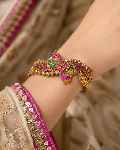 FeelOri ruby-tone and emerald-tone bangles styled with Indian occasion wear