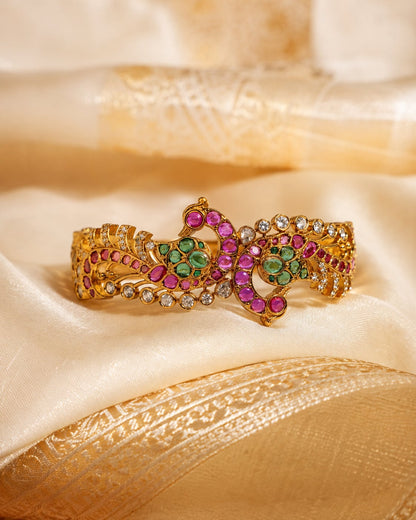 FeelOri ruby-tone and emerald-tone bangles styled with saree fabric for Indian occasion wear