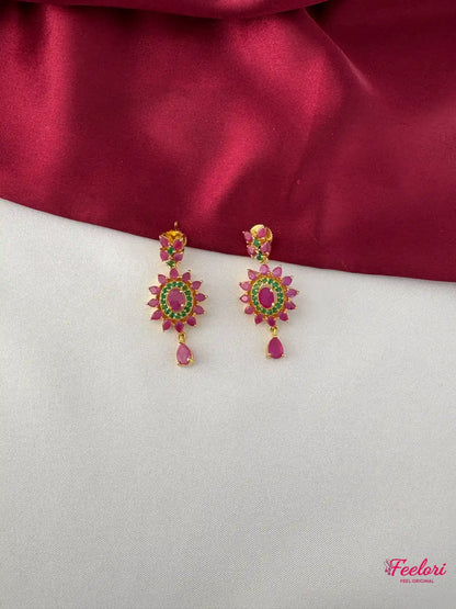 FeelOri Gold Plated Floral Ruby Emerald Earrings - Close-up view highlighting the detailed stone setting and tear-drop design.