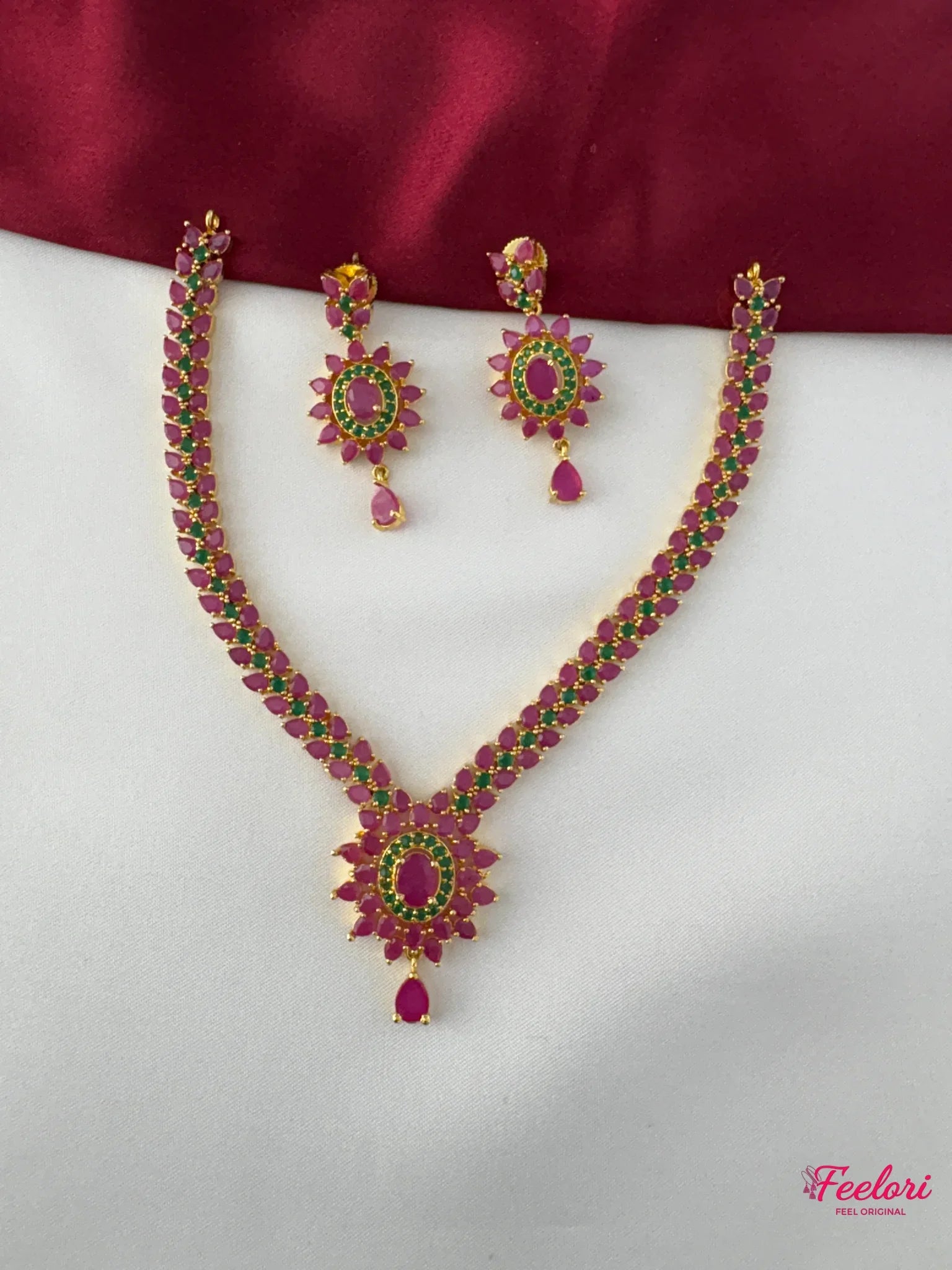 FeelOri Gold Plated Floral Ruby Emerald Necklace Set - Front view showing the complete design with necklace and earrings displayed together.