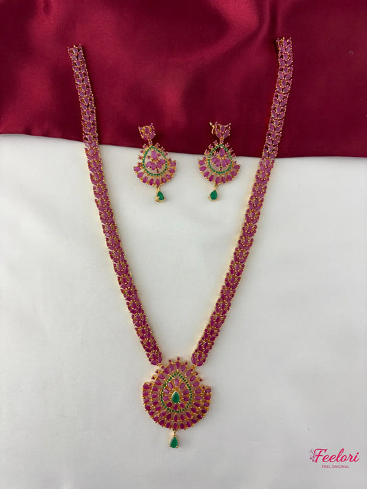FeelOri Gold Plated Ruby Emerald Necklace Set - Full set view showing the long necklace with a prominent teardrop pendant and matching earrings.