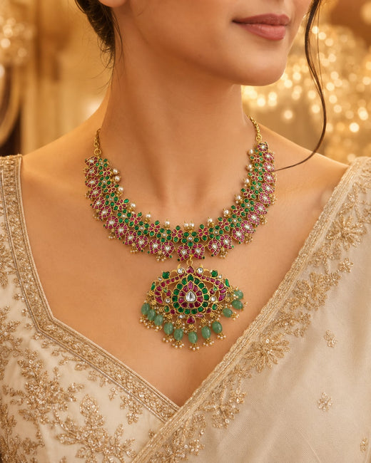 FeelOri ruby green mango motif jadau kundan necklace styled on a model