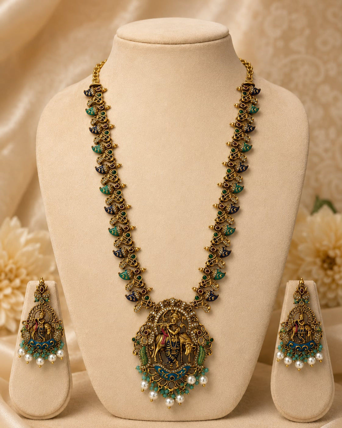 FeelOri ruby and emerald necklace set with matching earrings on jewellery display