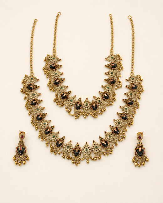 FeelOri ruby and emerald necklace set with matching earrings on jewellery display