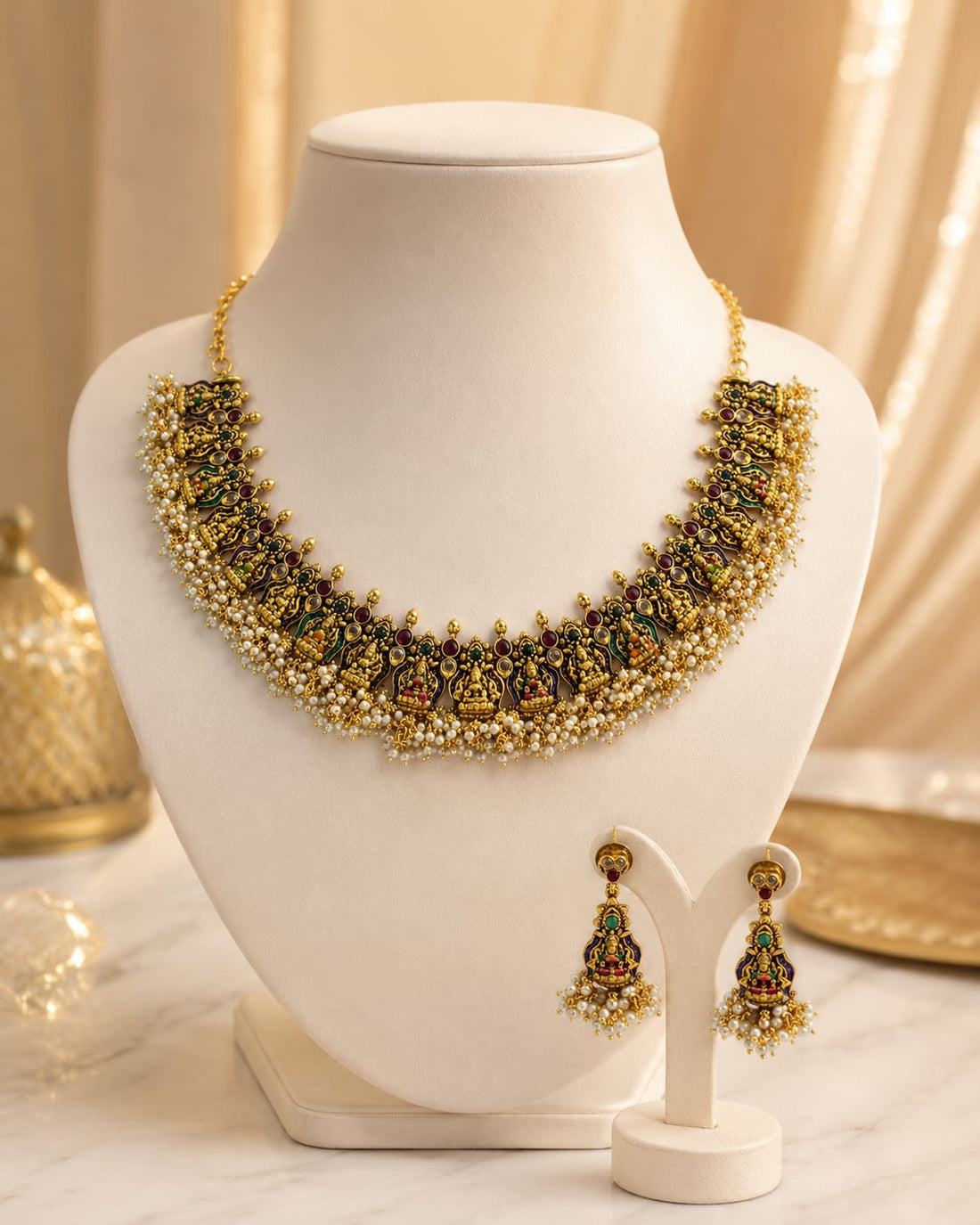 FeelOri ruby and emerald necklace set with matching earrings on jewellery display