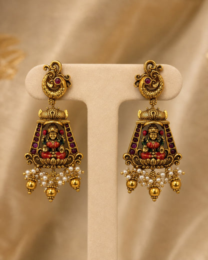 FeelOri ruby and emerald necklace set with matching earrings matching earrings only on a clean jewellery display