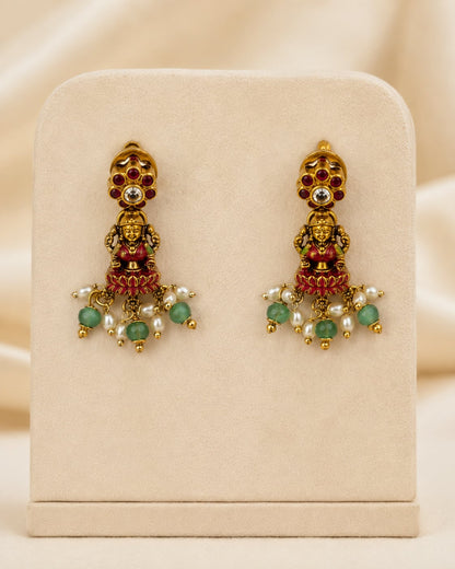 FeelOri ruby and emerald necklace set with matching earrings matching earrings only on a clean jewellery display