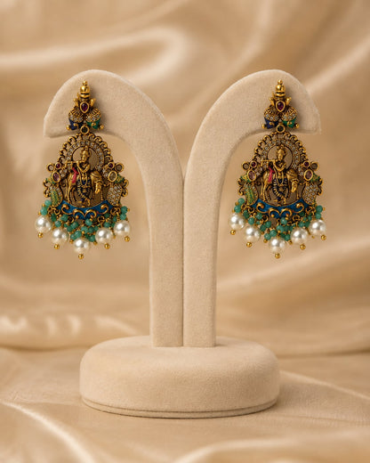 FeelOri ruby and emerald necklace set with matching earrings matching earrings only on a clean jewellery display