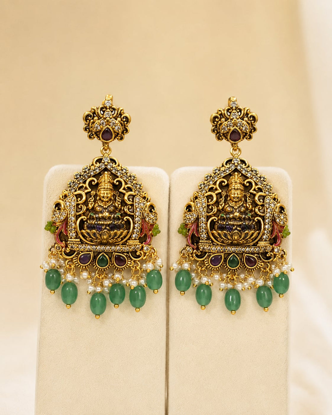 FeelOri ruby and emerald necklace set with matching earrings matching earrings only on a clean jewellery display