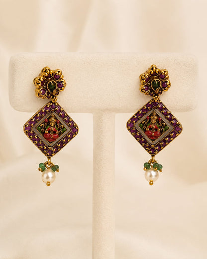 FeelOri ruby and emerald necklace set with matching earrings matching earrings only on a clean jewellery display