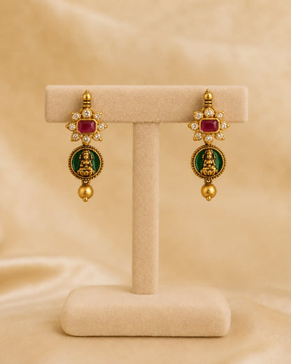 FeelOri ruby and emerald necklace set with matching earrings matching earrings only on a clean jewellery display