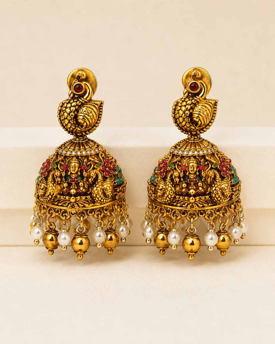 FeelOri ruby and emerald necklace set with matching earrings matching earrings only on a clean jewellery display