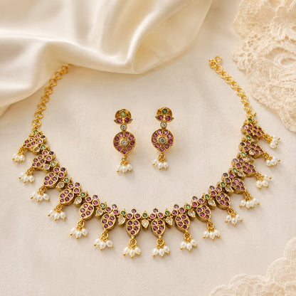 FeelOri ruby-tone and emerald-tone necklace set with matching earrings styled with Indian occasion wear