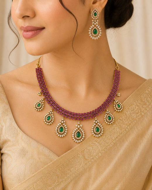 FeelOri ruby and emerald necklace set with matching earrings styled with Indian occasion wear
