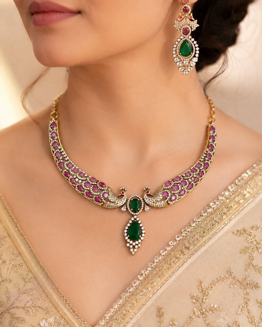 FeelOri ruby and emerald necklace set with matching earrings styled with Indian occasion wear
