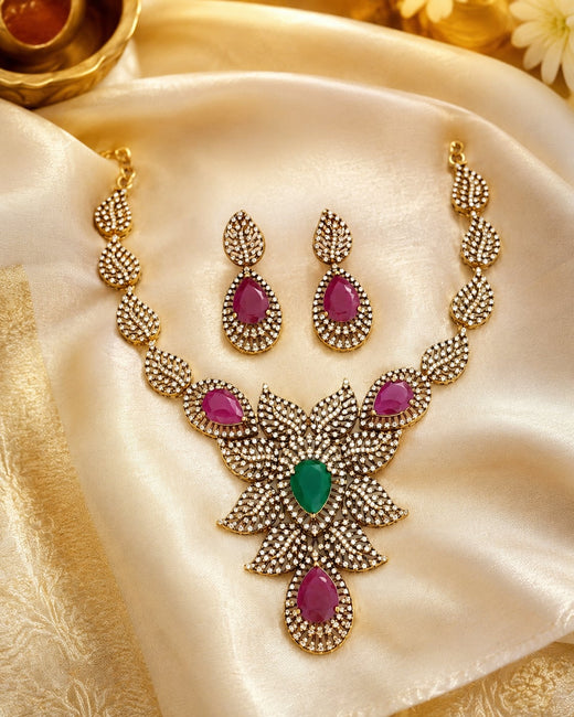 FeelOri ruby and emerald necklace set with matching earrings styled with Indian occasion wear