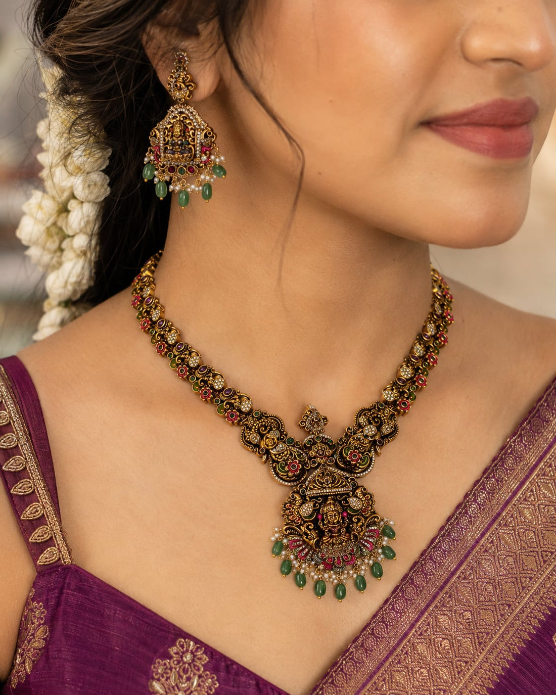 FeelOri ruby and emerald necklace set with matching earrings styled with Indian occasion wear