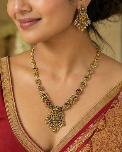 FeelOri ruby and emerald necklace set with matching earrings styled with Indian occasion wear