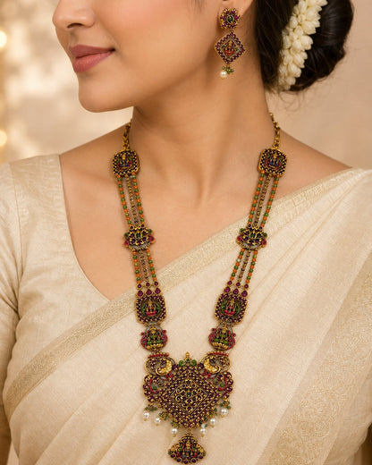FeelOri ruby and emerald necklace set with matching earrings styled with Indian occasion wear