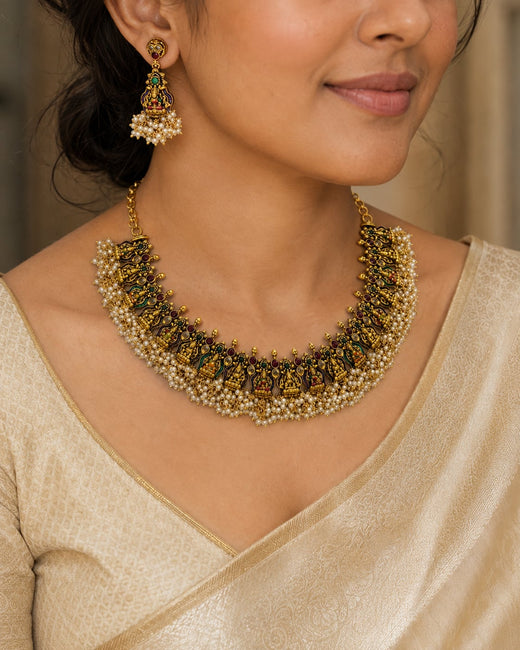 FeelOri ruby and emerald necklace set with matching earrings styled with Indian occasion wear