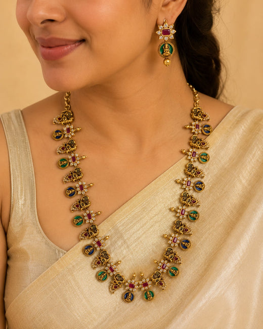 FeelOri ruby and emerald necklace set with matching earrings styled with Indian occasion wear