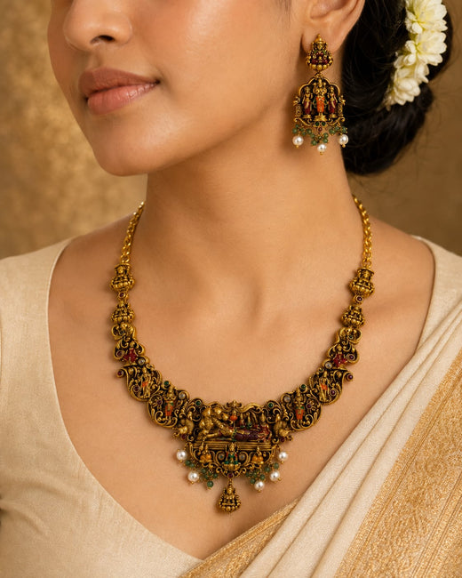 FeelOri ruby and emerald necklace set with matching earrings styled with Indian occasion wear