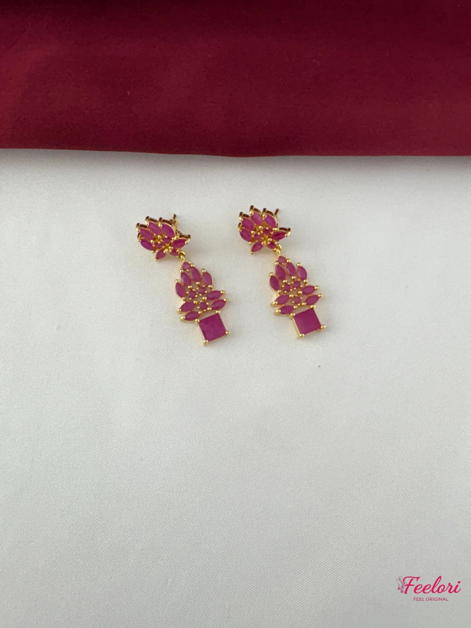 FeelOri Gold Plated Ruby Marquise Drop Earrings - Detailed view of the handcrafted earrings featuring marquise-cut ruby stones and push-back closure.