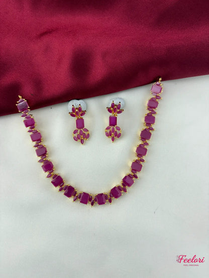FeelOri Gold Plated Ruby Necklace & Earring Set - Full view showcasing the square cut stone necklace and matching dangle earrings.