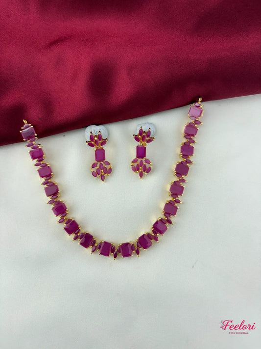 FeelOri Gold Plated Ruby Necklace & Earring Set - Full view showcasing the square cut stone necklace and matching dangle earrings.
