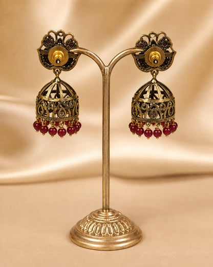 FeelOri ruby jhumka earrings rear view showing openwork reverse, straight posts, and push-back closures