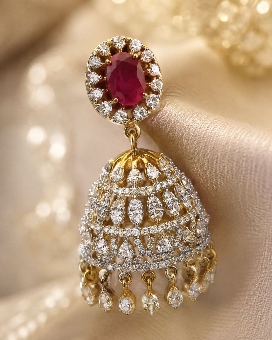 FeelOri ruby jhumka earrings stone setting, ear-chain or earring construction, and gold-polished finish detail