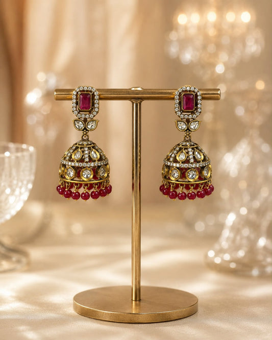 FeelOri ruby jhumka earrings on jewellery display