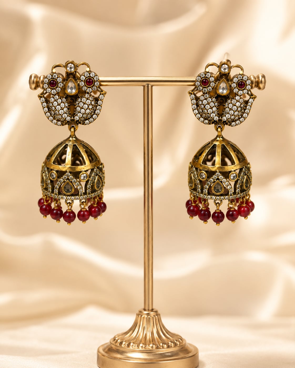 FeelOri ruby jhumka earrings on jewellery display
