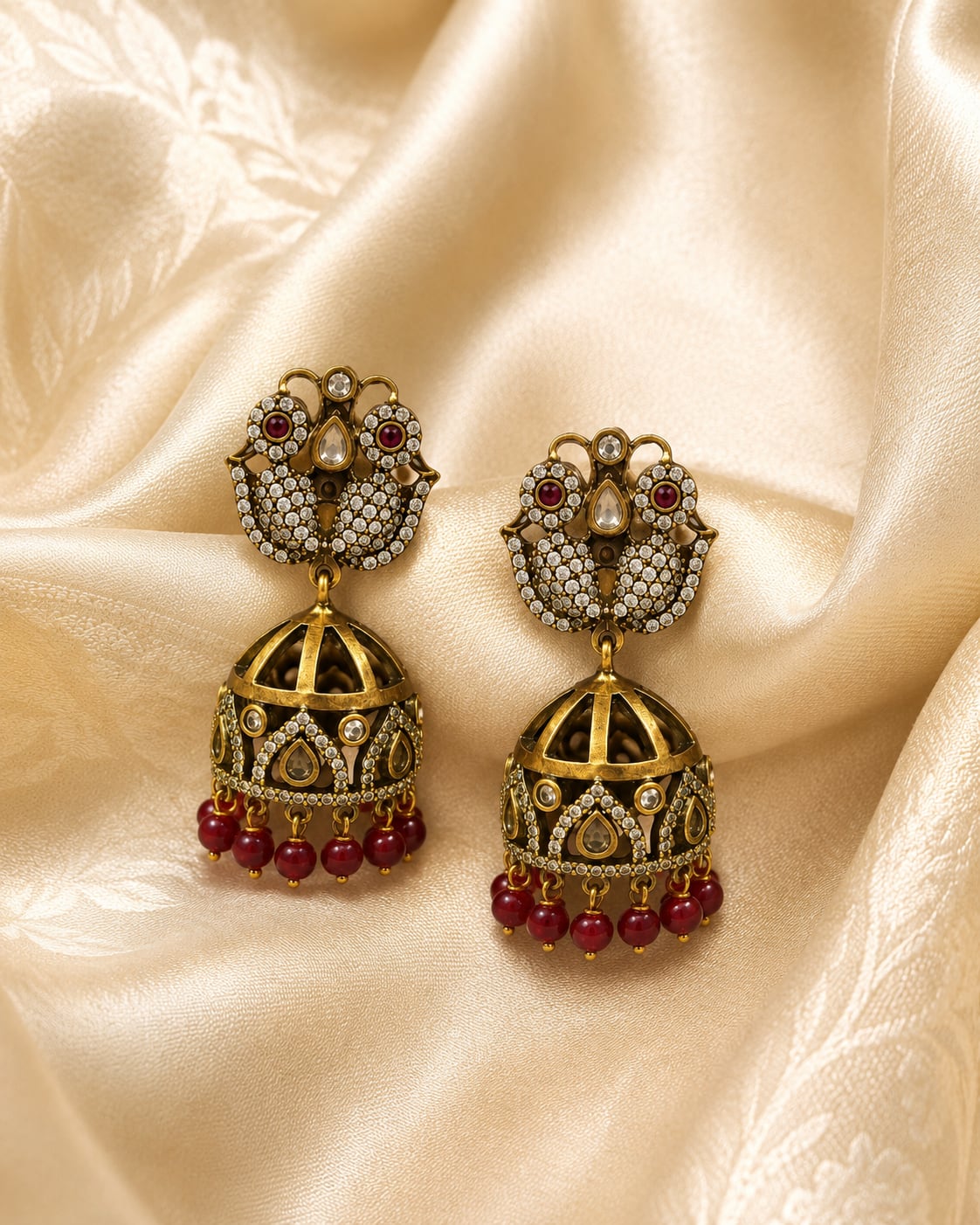 FeelOri ruby jhumka earrings styled with saree fabric for Indian occasion wear