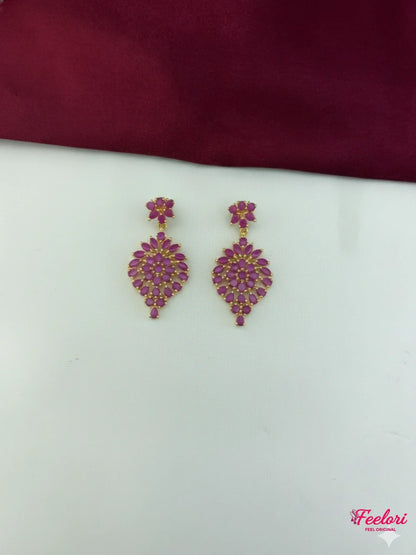 FeelOri Gold Plated Ruby Leaf Cluster Earrings - Detailed view of the matching earrings, highlighting the vibrant ruby-hued stones and craftsmanship.