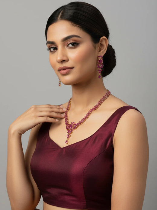FeelOri Gold Plated Ruby Petal Necklace Set - Model wearing elegant set with maroon top.
