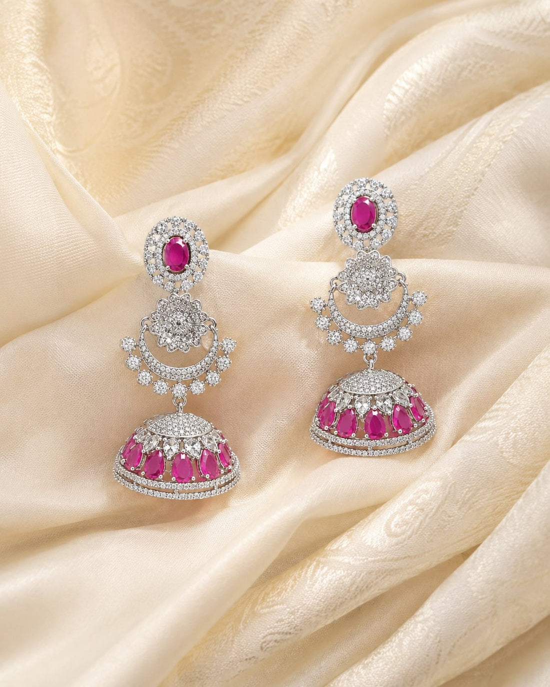FeelOri Pink Silver Rhodium CZ Three Tier Pearl Look Jhumka Earrings - silk styling view